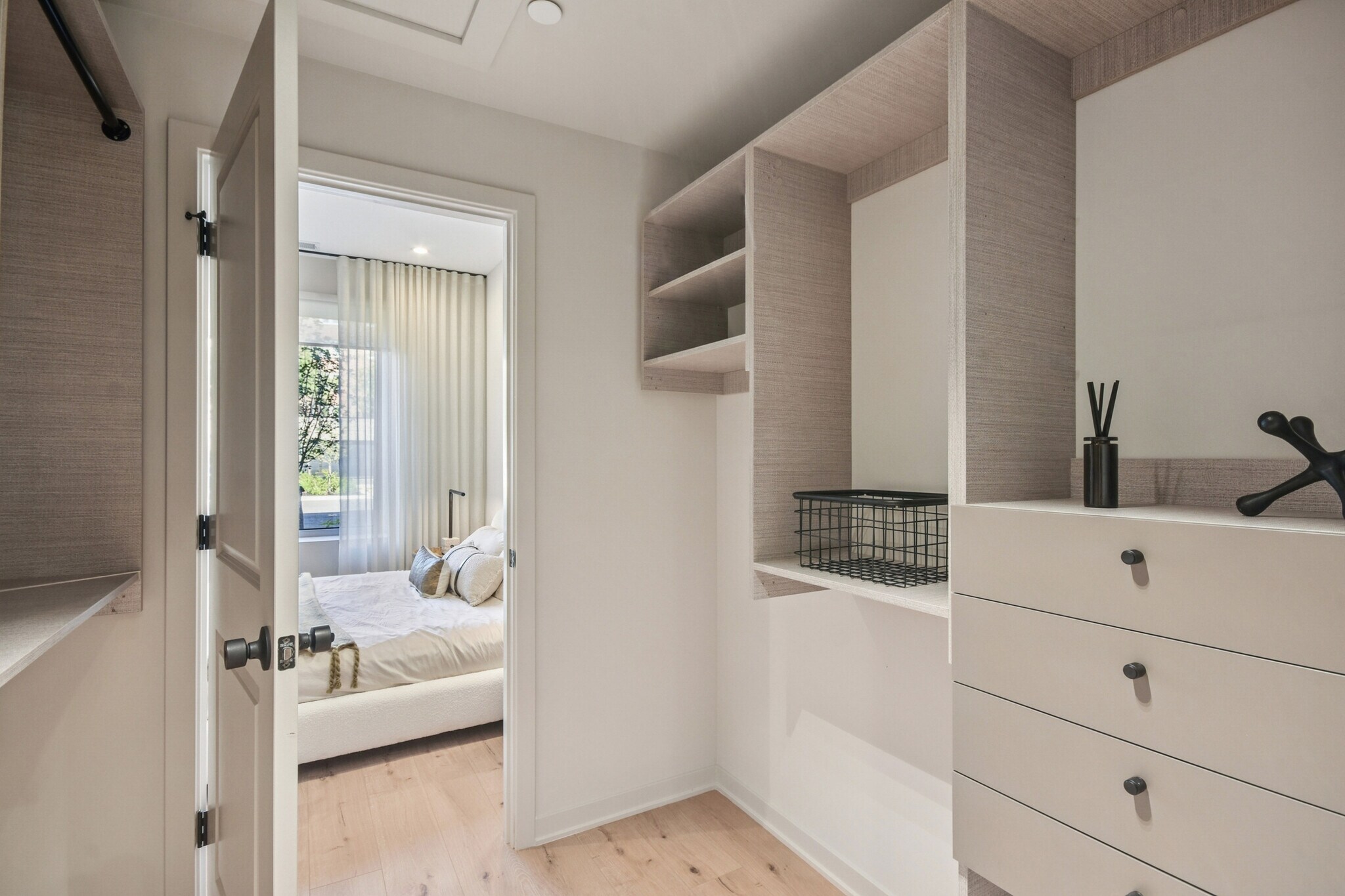 Walk-in closet opening to the bedroom